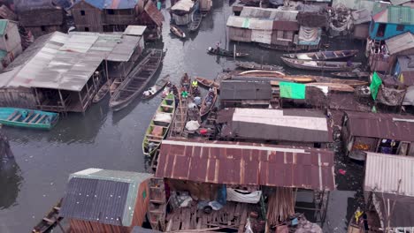 Makoko-Community,-Lagos,-Nigeria---30-June-2024:-Drone-view-of-Makoko-community-across-the-3rd-Mainland-Bridge