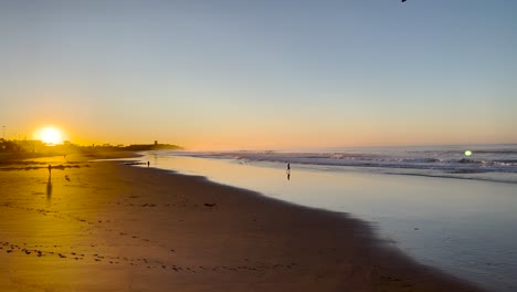 Morning-Sunrise-on-the-beach,-calm-hopeful-start-of-day,-clear-sky-serenity