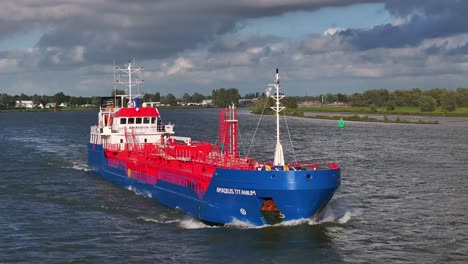 Front-view-of-Amadeus-Titanium-cargo-ship-on-a-river-journey