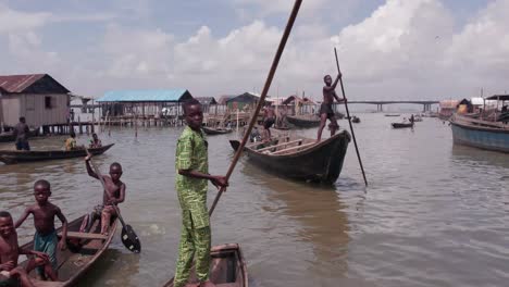 Makoko-Community,-Lagos,-Nigeria---30-June-2024:-Drone-view-of-Makoko-community-across-the-3rd-Mainland-Bridge