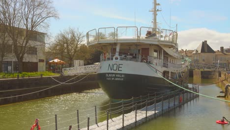 Panning-shot-of-one-of-the-old-boats-at-the-National-Maritime-Museum-in-Rochefort,-France