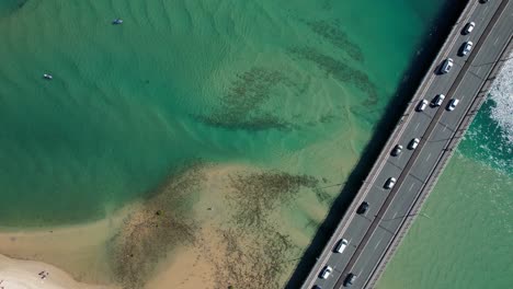 Above-View-Of-Cars-Driving-Over-Tallebudgera-Creek-Bridge-In-Burleigh-Heads,-Gold-Coast,-QLD-Australia