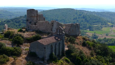 Aerial-establishing-shot-of-the-ruins-on-display-at-Château-Bas-d'Aumelas