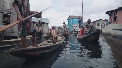 Makoko-Community,-Lagos,-Nigeria---30-June-2024:-Video-of-children-and-people-engaging-in-different-activities-in-Makoko-community-across-the-3rd-Mainland-Bridge