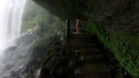 Bikini-girl-Path-leading-to-tall-waterfall-in-Lacandon-Jungle-Chiapas-Mexico-Misol-Ha