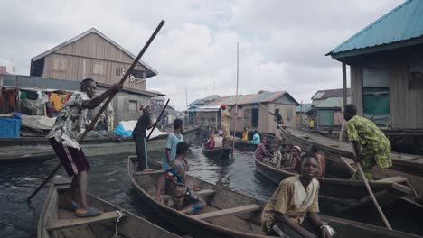 Makoko-Community,-Lagos,-Nigeria---30-June-2024:-Video-of-children-and-people-engaging-in-different-activities-in-Makoko-community-across-the-3rd-Mainland-Bridge