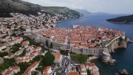 Stunning-old-city-Dubrovnik,-roman-empire-in-Croatia,-cityscape-aerial-orbit