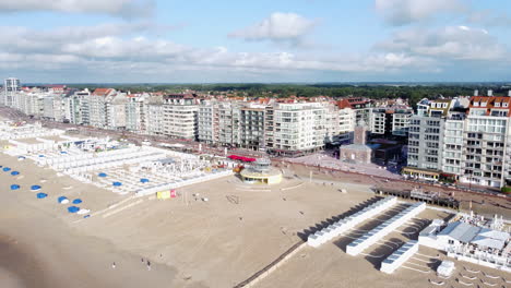 Lighthouse-Beach-in-Knokke,-Aerial-Orbit-on-a-Sunny-Summer-Day