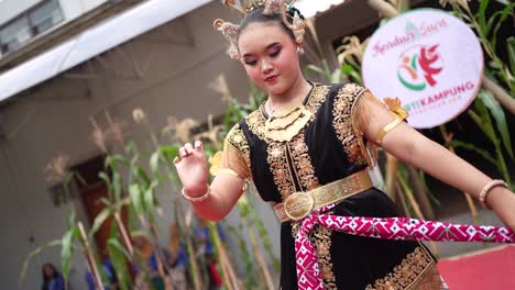 The-appearance-of-a-graceful-girl-dancing-a-typical-Javanese-dance,-namely-the-Serimpi-Dance