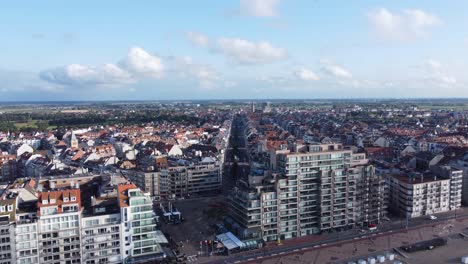 Knokke-City-Long-Aerial-Pullback-to-the-North-Sea-Beach---Sunny-Day