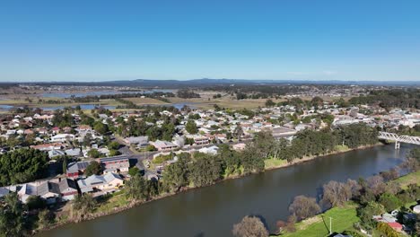 Morpeth-NSW-Drone-shot-flying-over-Hunter-River-towards-bridge