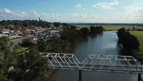 Morpeth-NSW-Drone-shot-flying-over-Hunter-River-towards-bridge