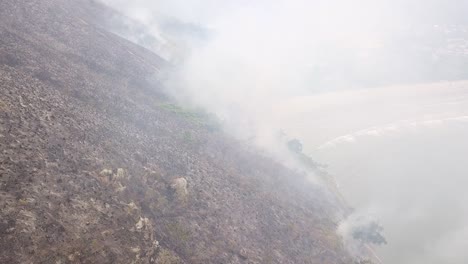 Scene-of-heavy-smoke-left-by-fire-on-hill