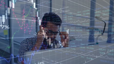 Financial-data-and-stock-market-trends-animation-over-stressed-business-person