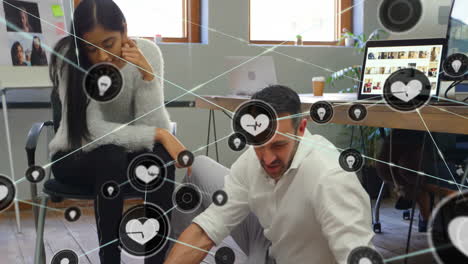 Collaborating-in-modern-office,-diverse-colleagues-with-social-media-interaction-animation