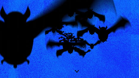 Flying-bats-over-blue-background-with-dark-shadows