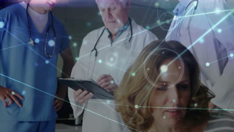 Discussing-patient-data-over-network-connections,-medical-professionals-in-animation