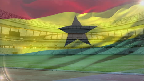 Animación-De-La-Bandera-De-Ghana-Sobre-Un-Estadio-Vacío-Con-Campo-Verde-Y-Pista