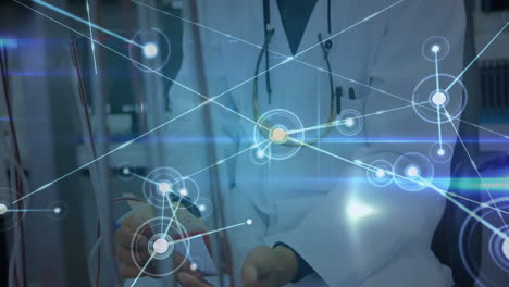 Network-of-connections-and-data-processing-animation-over-medical-professionals-in-hospital