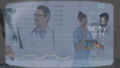 Medical-data-and-vital-signs-animation-over-doctors-in-hospital-setting