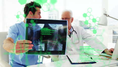 Doctors-examining-X-ray-with-medical-data-animation-over-green-hexagonal-patterns