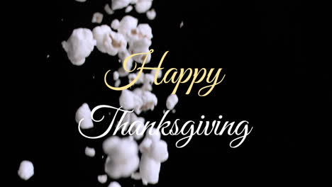 Happy-Thanksgiving-text-animation-over-falling-popcorn-on-black-background