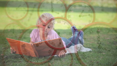 Reading-book-on-grass,-child-surrounded-by-clock-faces-animation