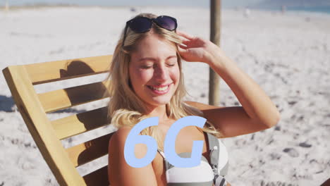 Relaxing-on-beach-chair,-woman-smiling-with-6G-animation-over-scene