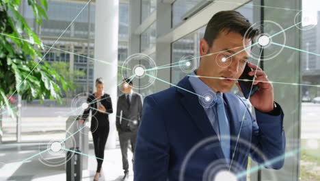 Talking-on-phone,-businessman-with-network-connections-animation-in-office-background