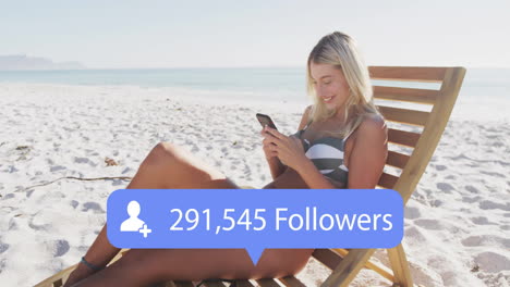 Sitting-on-beach-chair-and-using-smartphone,-woman-with-followers-count-animation