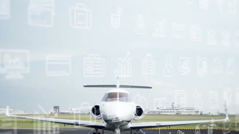 Airplane-on-runway-with-business-icons-animation-over-sky-background