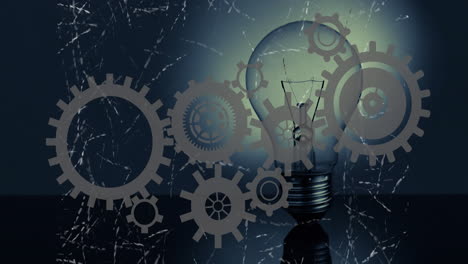 Gears-and-cogs-animation-over-light-bulb,-symbolizing-innovation-and-mechanics