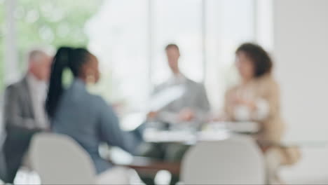 Business-people,-meeting-in-blurred-office