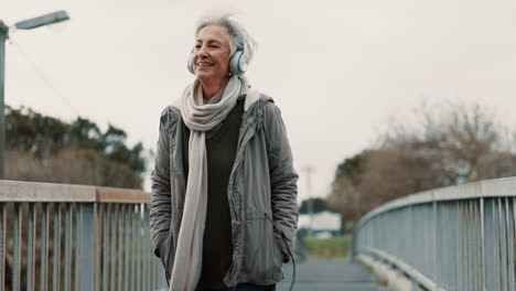 Senior-woman,-headphones-and-music-outdoor