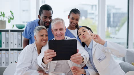 Selfie,-tablet-and-group-of-doctors