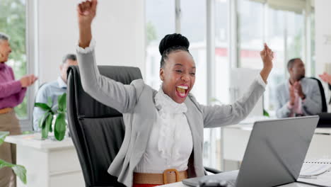 Black-woman-in-office-with-laptop