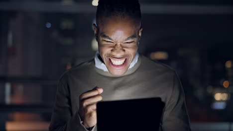 Night,-tablet-and-winner-with-black-man-in-office