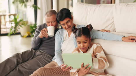 Happy,-grandparents-and-girl-with-a-tablet-in-home