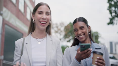 Business,-friends-and-phone-in-city-with-women
