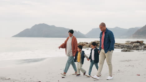 Grandmother,-father-and-kids-walking-on-beach