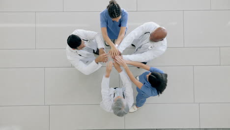 Top-view,-hands-together-and-doctors