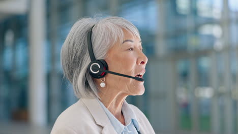 Senior-woman,-talk-and-listen-in-call-center