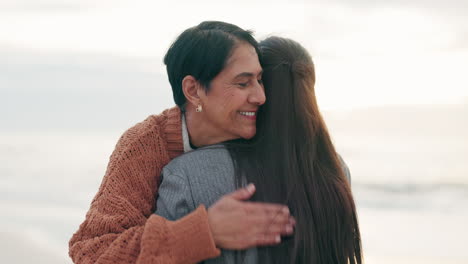 Elderly-mother,-woman-and-hug-at-beach-with-love