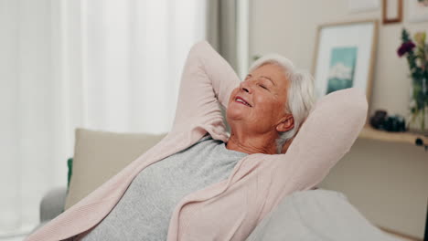 Relax,-couch-and-senior-woman-stretching-for-calm