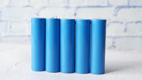Close-up-of-batteries-on-table-,