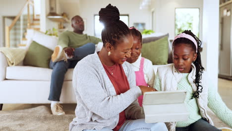 Mother-playing-a-game-on-a-tablet-with-kids