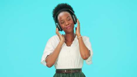 Music,-dance-and-black-woman-with-headphones