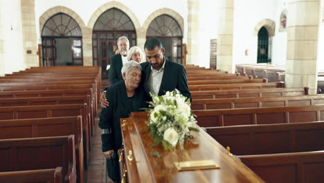 Funeral,-church-and-people-hug-by-coffin