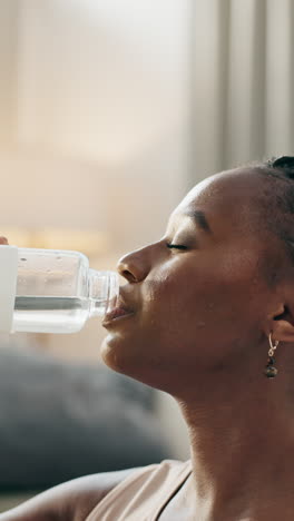 Thirsty,-fitness-and-black-woman-drinking-water