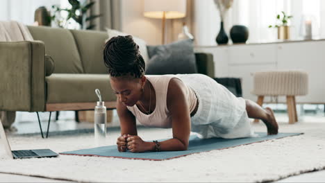Laptop,-yoga-and-fitness-with-a-black-woman